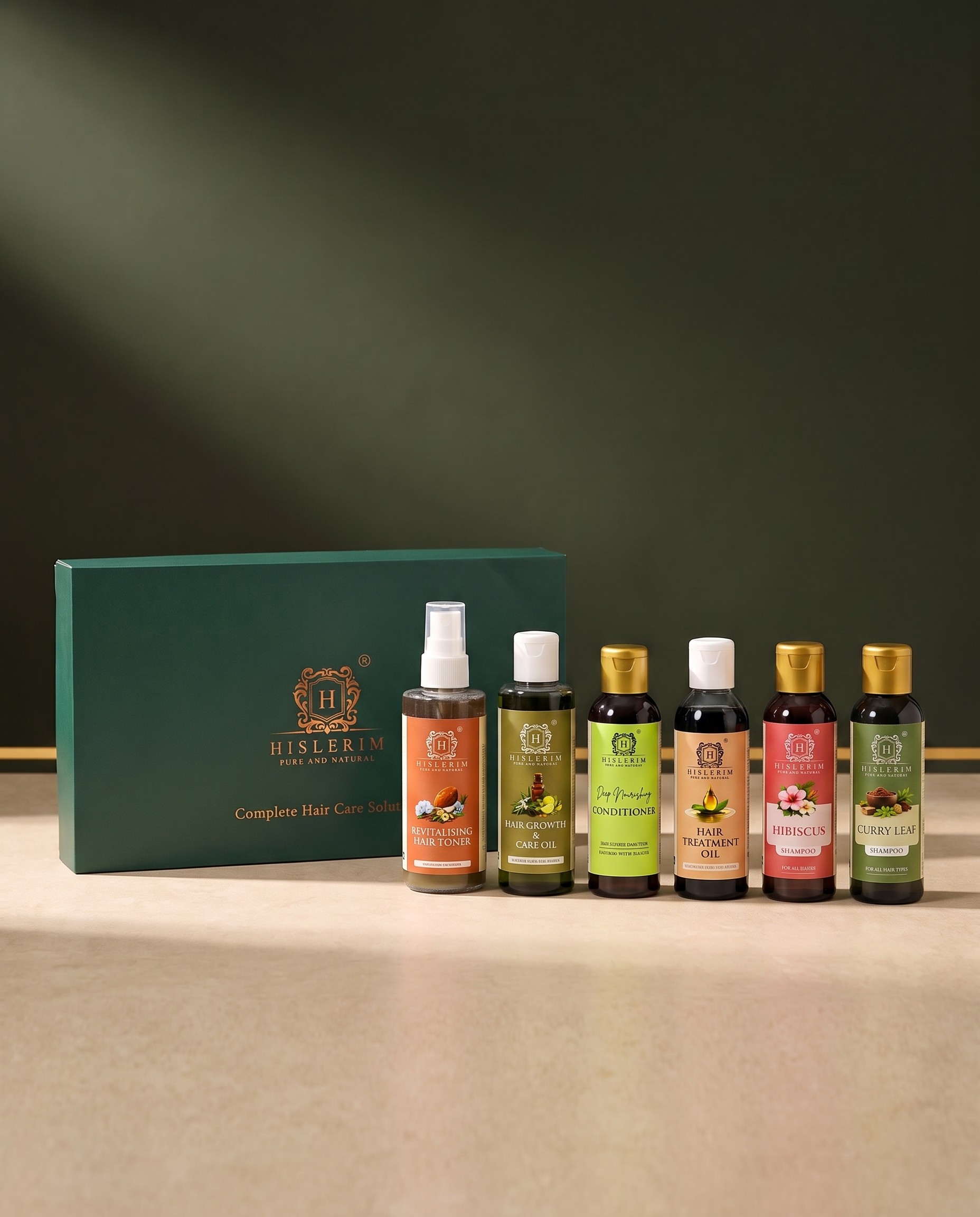 Complete Hair Care Gift Pack gift box containing Curry Leaf Shampoo (50 ml), Hibiscus Shampoo (50 ml), Revitalising Hair Toner (100 ml), Hair Growth and Care Oil (100 ml), Deep Nourishing Conditioner (50 ml), Hair Treatment Oil (50 ml)